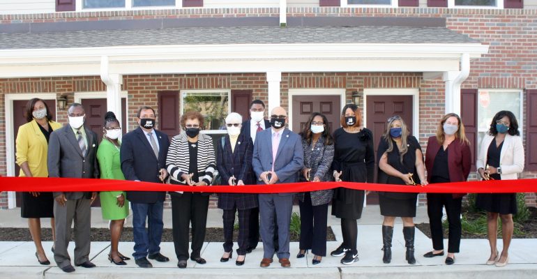 Cutting the ribbon on Thursday, Oct. 15, 2020 to mark the completion of downtown Trenton’s newest affordable housing community, Turner Pointe, were (l. to r.) THA Redevelopment Project Mgr. Chrysti Huff, THA Board Chair Clifton Anderson, THA Commissioner Darlene Weldon, NJ Assemblyman Anthony Verrelli, NJ St. Sen. Shirley Turner (the namesake of Turner Pointe), Trenton City Councilwoman Marge-Caldwell Wilson, THA Exec. Dir. Jelani Garrett, Trenton Mayor Reed Gusciora, NJ Assemblywoman Verlina Reynolds-Jackson, NJ Lieutenant Governor Sheila Oliver, HUD Regional Administrator Lynne Patton, TD Bank VP Sue Taylor, and Conifer Realty Project Director Janine Owens.